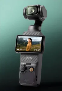 Compact handheld DJI Osmo gimbal camera with display screen showing outdoor video recording, featuring smart vlogging technology and trending products India for travel creators and filmmakers.